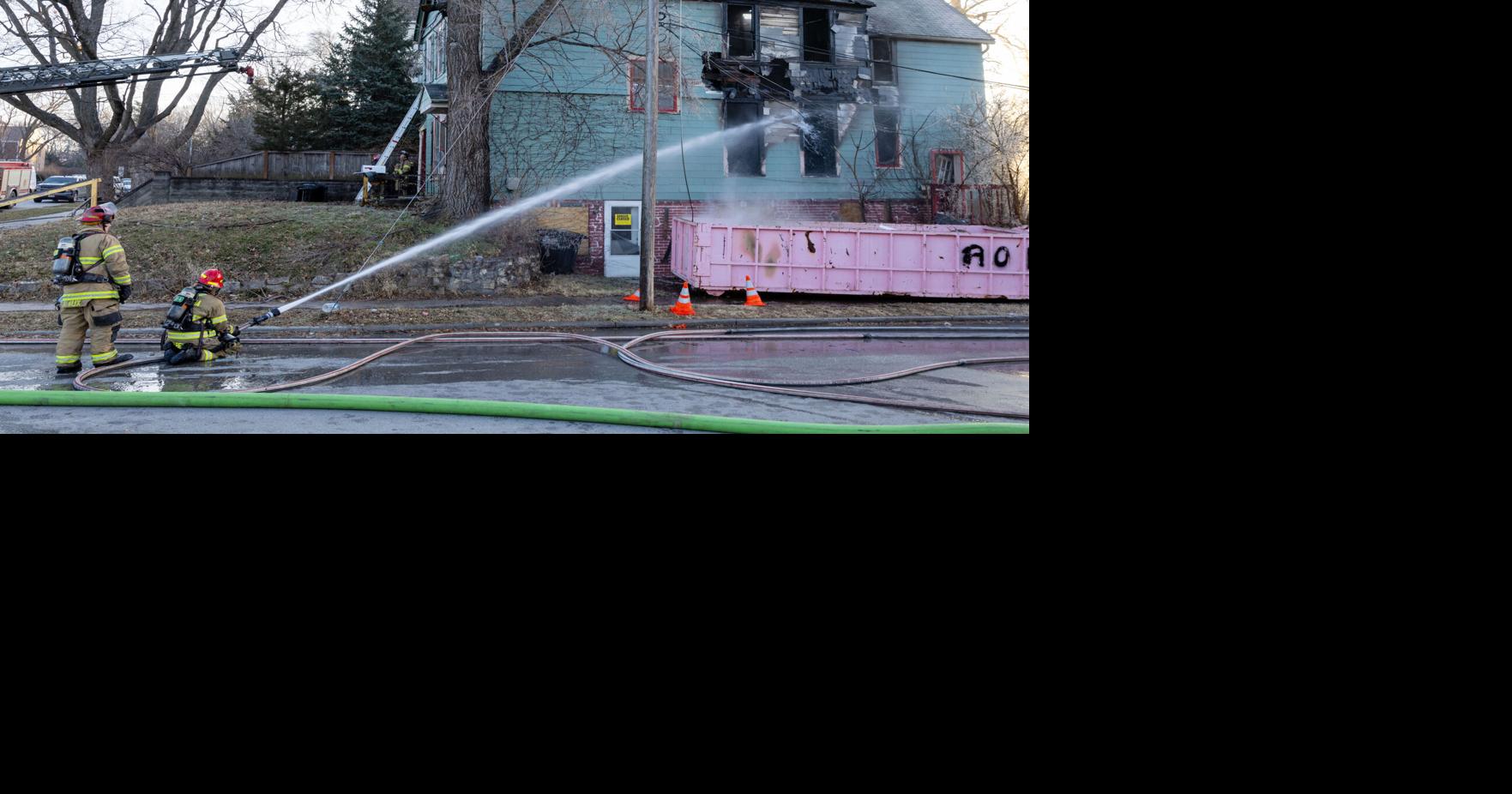 Omaha firefighters on defense during vacant house fire
