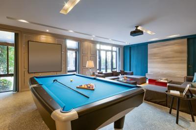 Modernizing The Man Cave Inspired Living Omaha Essential Ings In Any Man Cave Include At Least One Television Refrigerator Comfortable Seating And Minimal Décor Like Framed Posters Or