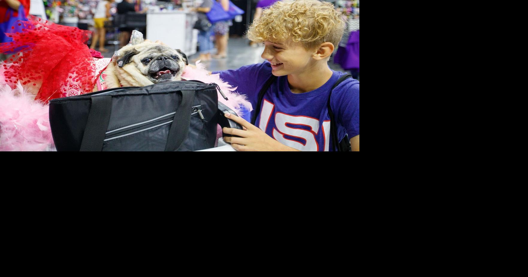 PickaPooch event at Baxter Arena matches furever friends with new owners