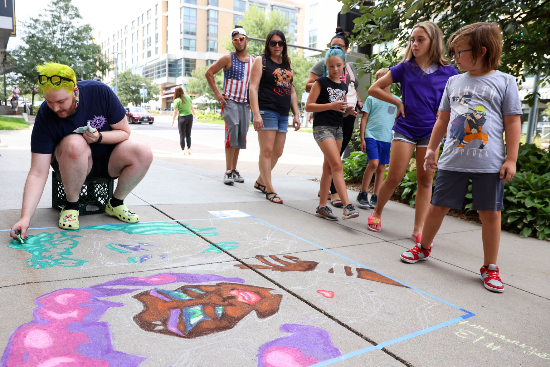 Omaha area artists bring color to Midtown Crossing during 5th annual chalk art festival