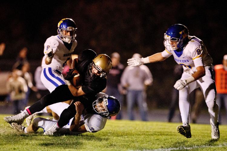 Pospisil No. 3 David City Aquinas downs No. 2 Wahoo in Class C1