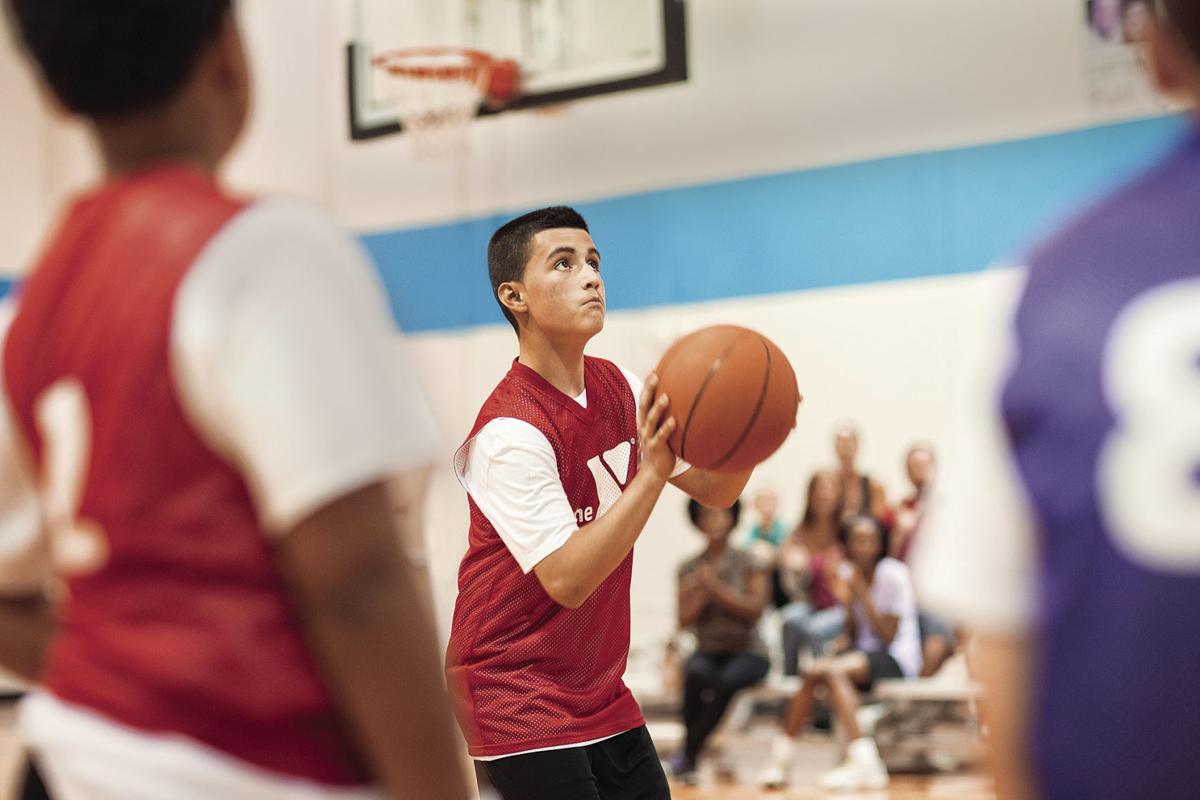 YMCA coaches Youth sports teach fundamentals, but that's not the big