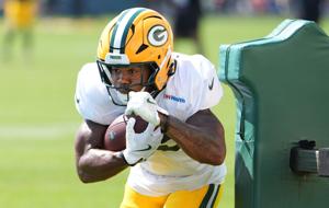 Green Bay Packers running back Josh Jacobs (8) participates in a drill during the fifth day of training camp on Aug. 3, 2026, at