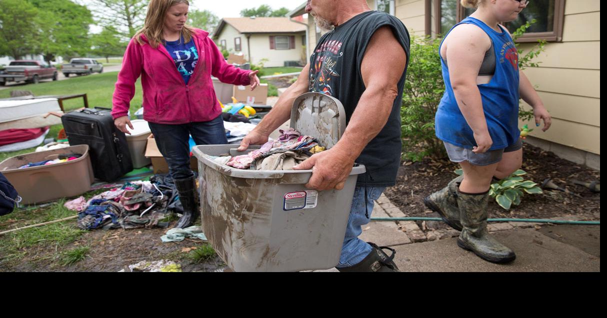 In water's wake, what's left behind in DeWitt is mud — a lot of it