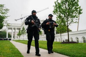 Suspect 'down' after shooting at officers near White House, official says