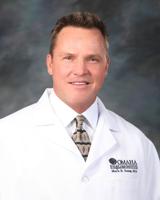 Dr. Mark R. Young, M.D.