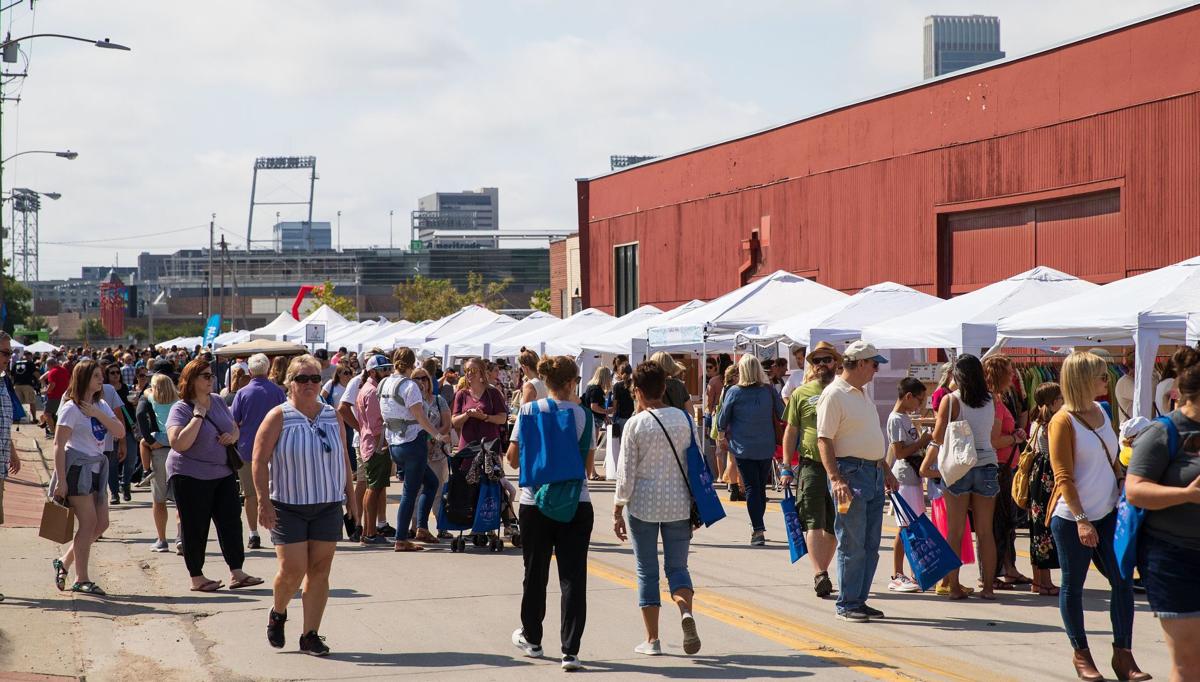 Grace Going shopping in north downtown at Hutchfest, where handmade counts