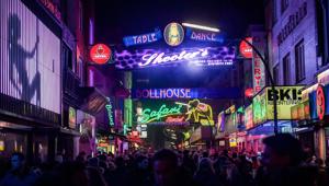 The world's most sinful mile? Many come to the 930 metre iconic street lined with pubs, bars and clubs.