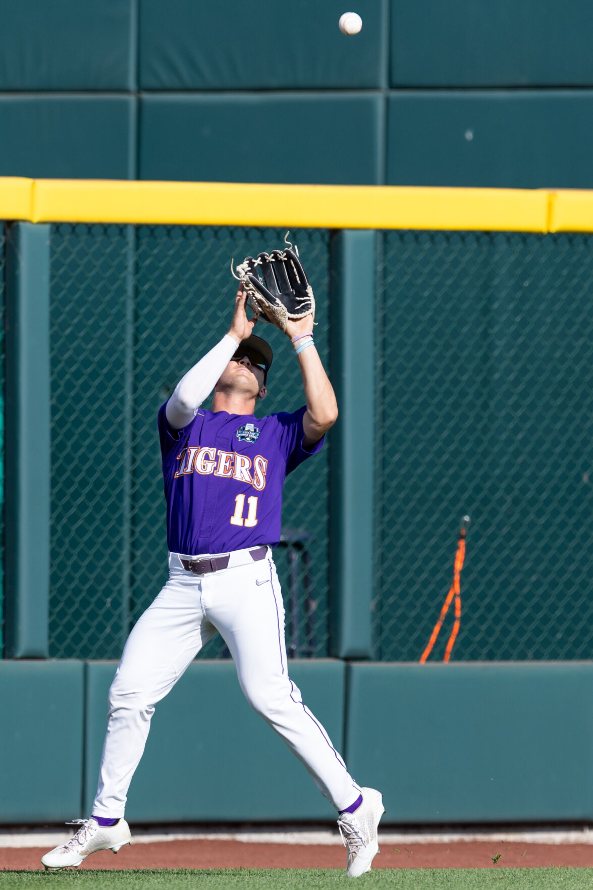 LSU outfielder Josh Pearson (11) throws before an NCAA baseball