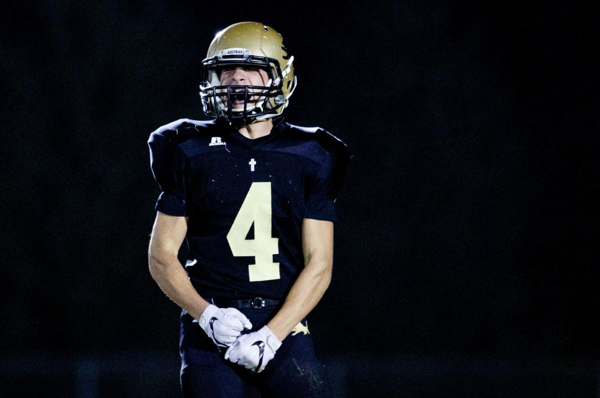 Pospisil No. 3 David City Aquinas downs No. 2 Wahoo in Class C1