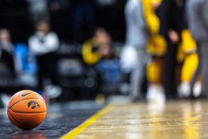 An Iowa basketball with a Tigerhawk logo rests along the baseline during a NCAA non-conference men's basketball game, Monday, Nov., 11, 2019, at Carver-Hawkeye Arena in Iowa City, Iowa.191111 Depaul Iowa Mbb 029 Jpg