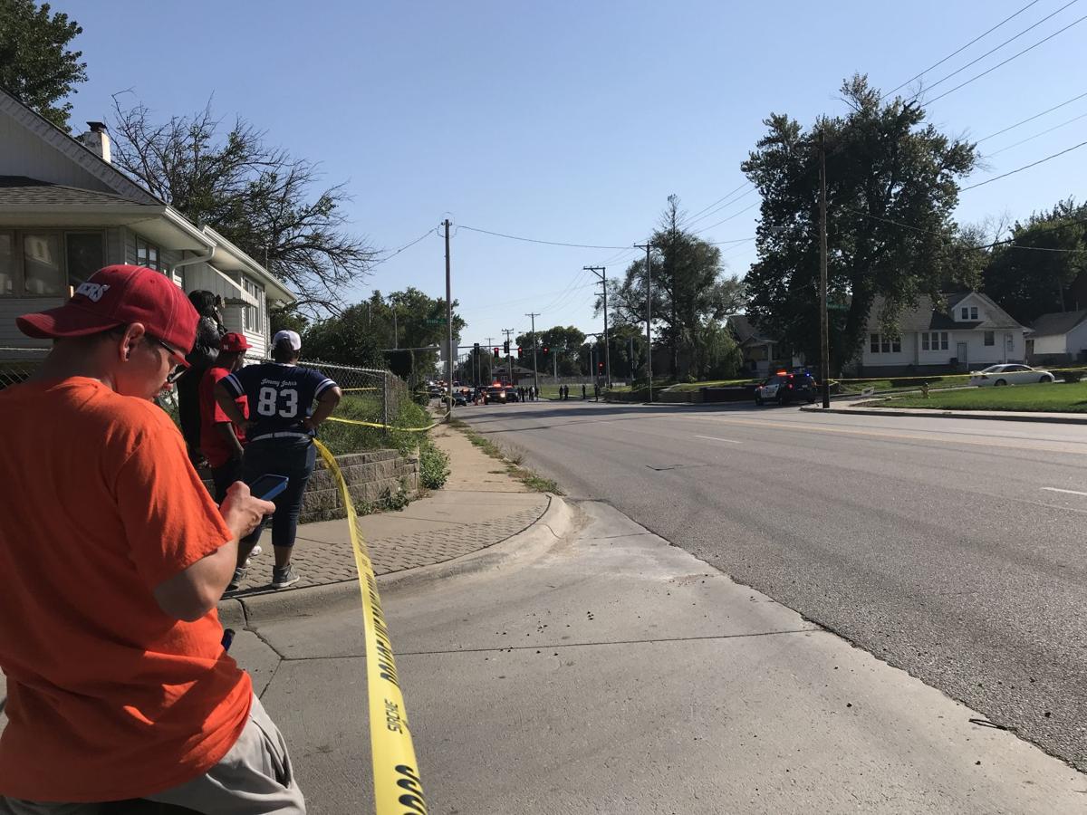 Omaha gang unit officer, suspect both stable after traffic stop