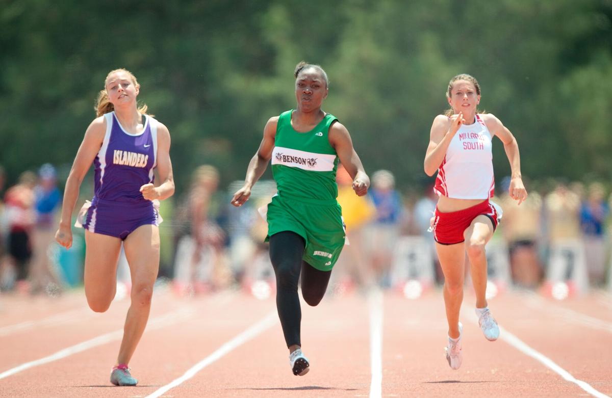 Photo Female athletes at the Nebraska state track meet through the years