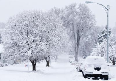 Slick roads slow morning traffic; more snow on the way?