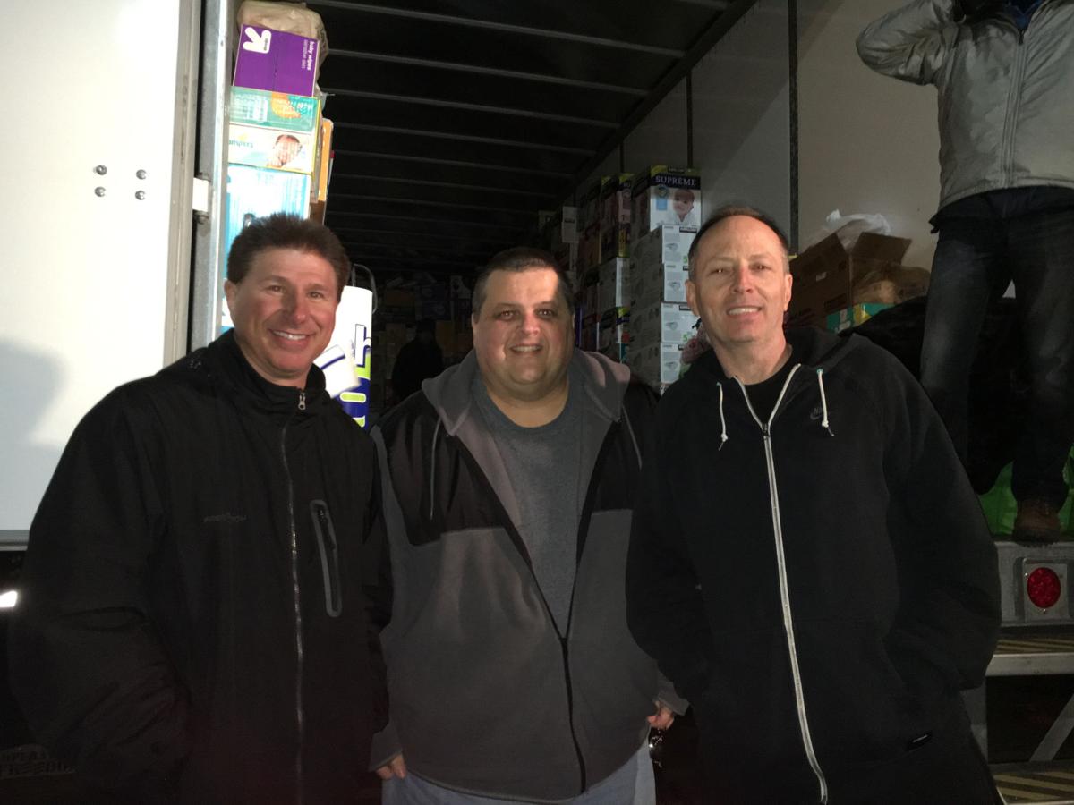 With a little help, 3 Omaha men bought and donated 8,064 diapers to