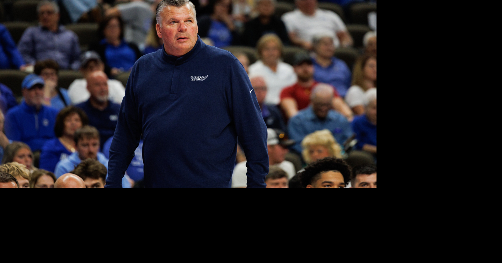Greg McDermott holds Owen Freeman and Jackson McAndrew in exhibition ...