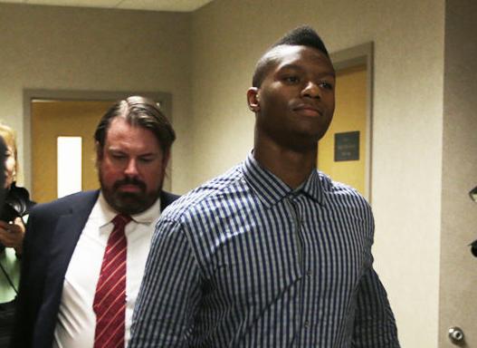 Joe Mixon leaving the courtroom