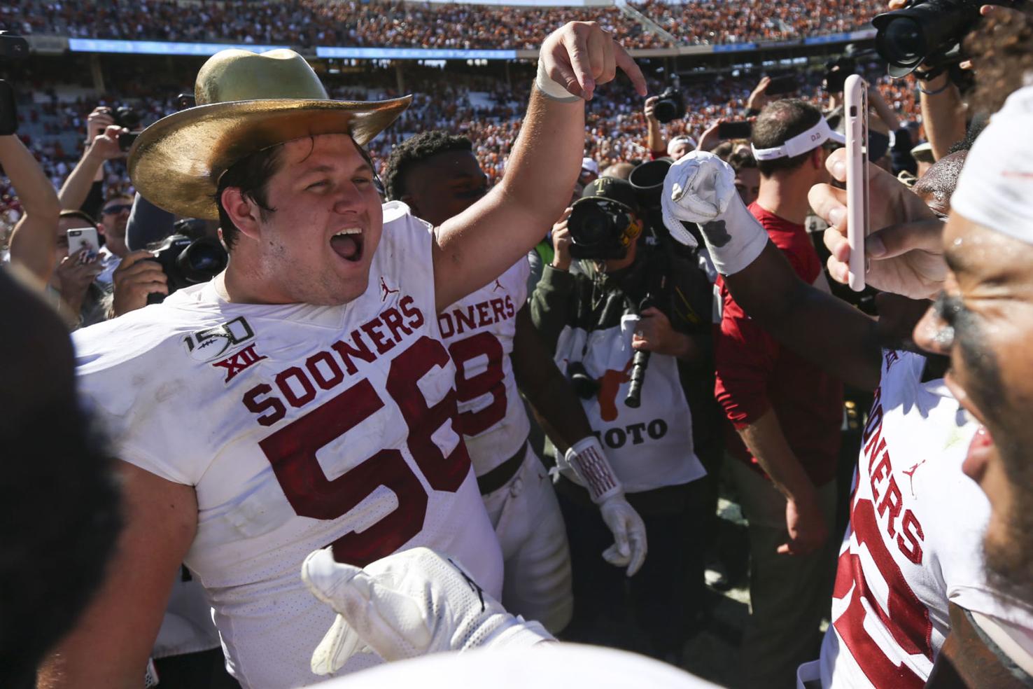 OU football Sooners celebrate after beating Texas in Red River