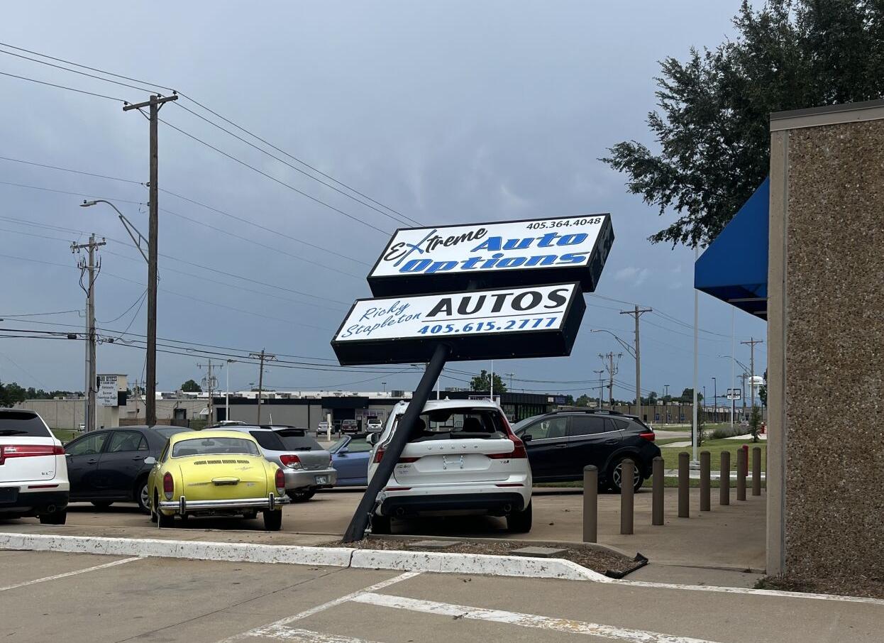Downed sign at Extreme Auto Options