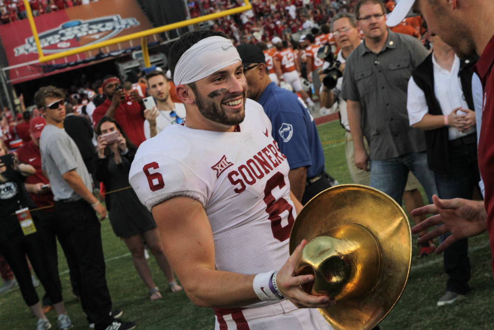 October 14, 2017:Oklahoma Sooners quarterback Baker Mayfield (6) celebrates  with the GOLDEN HAT trophy after the Red River Showdown NCAA Football game  between the University of Oklahoma Sooners and the University of