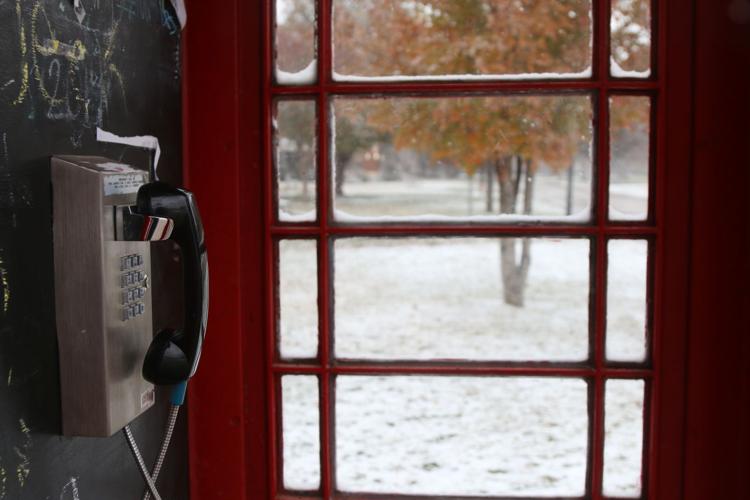 Inside the telephone booth