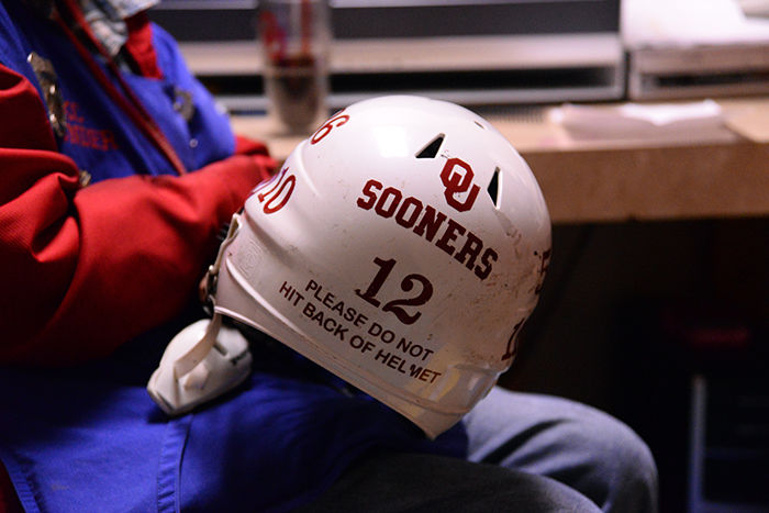 Please do not hit back of helmet