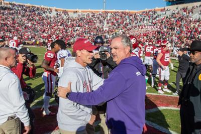 Brent Venables and Sonny Dykes