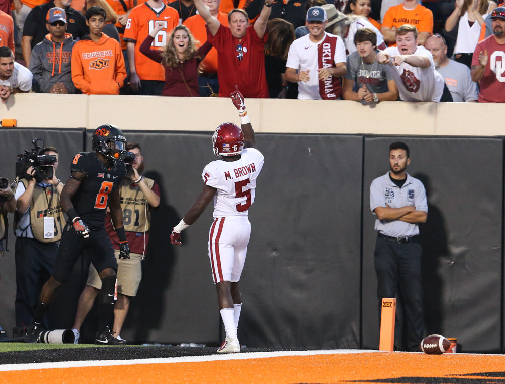 Mayfield's 598 yards lead Oklahoma past Oklahoma St. 62-52, OU / OSU