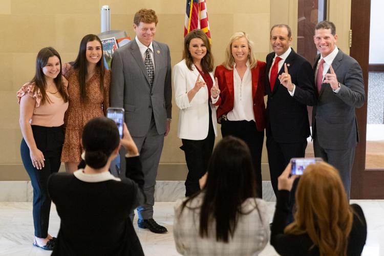 Attendees pose for a photo
