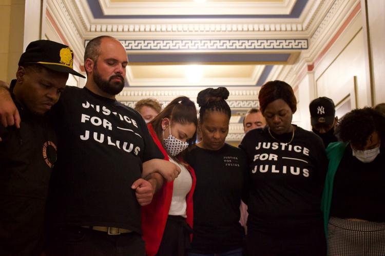 Julius Jones supporters praying in Capitol