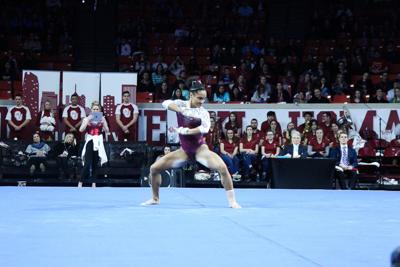 Senior AJ Jackson floor pose