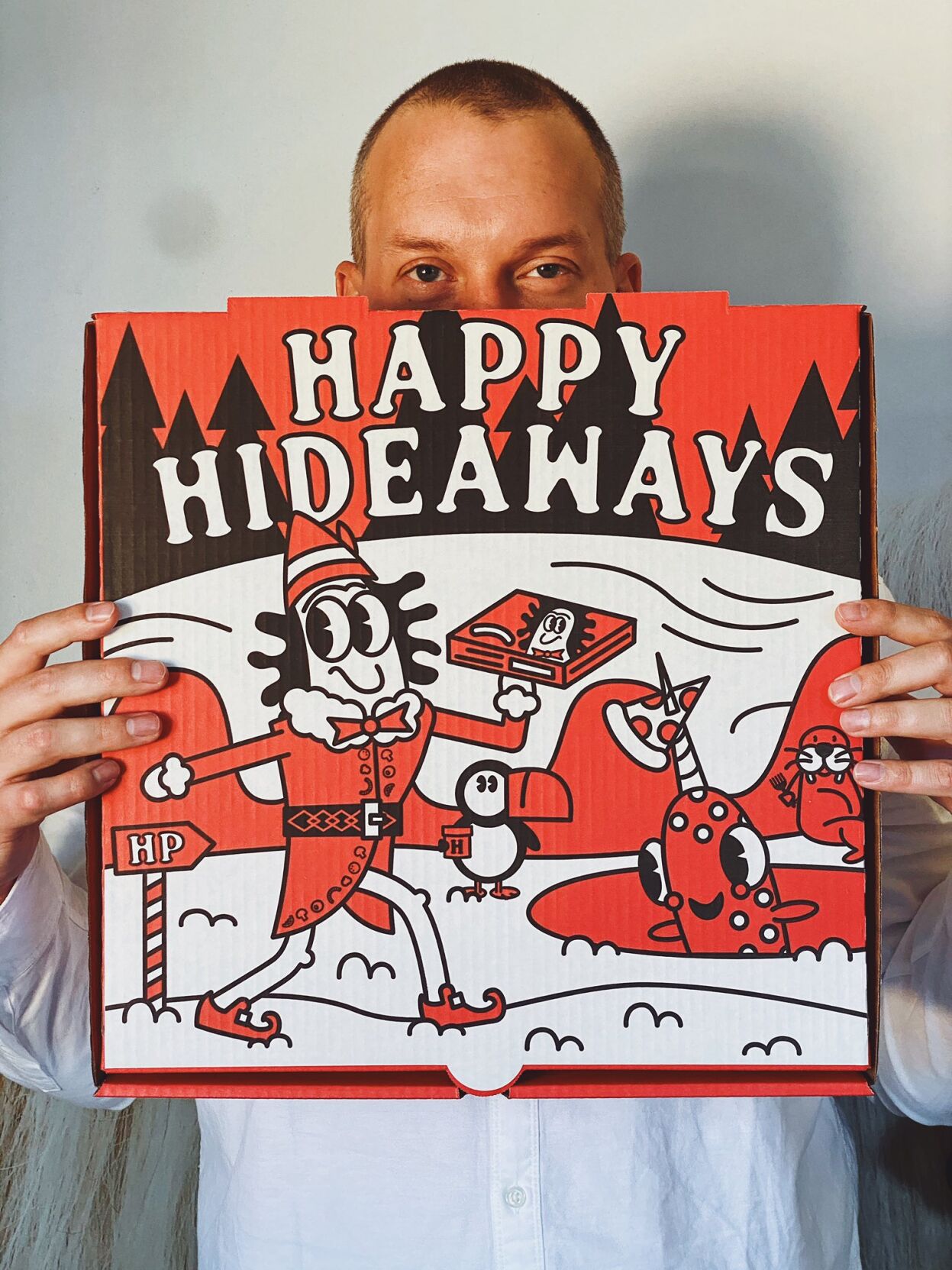 Hideaway Pizza collaborates with Norman artist for holiday-themed boxes ...