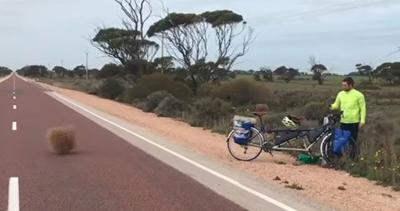 Docs travel world on bike built for two
