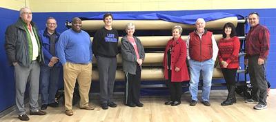 Alumni Association donates floor protection system to Livingston Academy