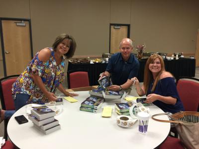 Carthage Rotary Club prepare dictionaries for area third-graders