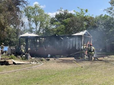 Pasco County firefighters respond to a large shed fire in Hudson