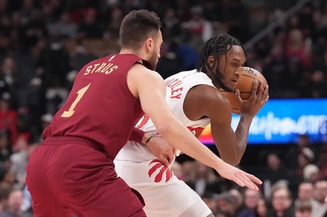 New look Raptors clip Cavaliers 124 121 in New Year s Day roller