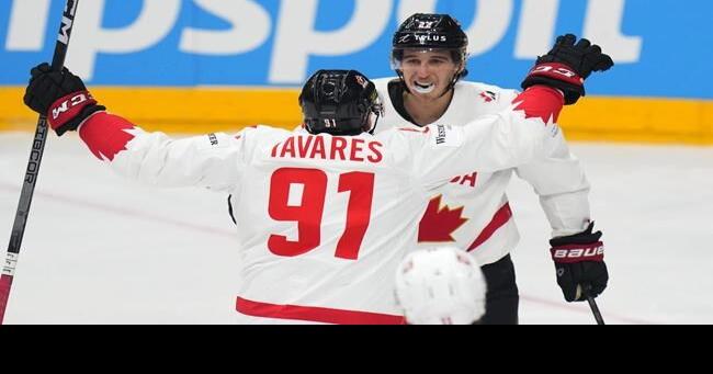 Cozens has two goals, assist as Canada edges Switzerland 3-2 at world hockey event