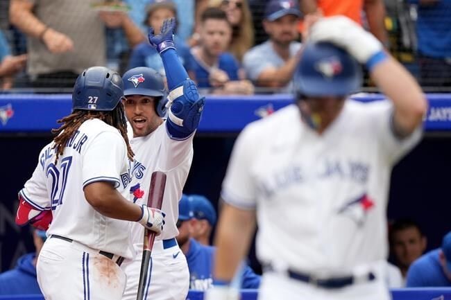 Heim hits grand slam as Rangers dump Jays 10-4 in opener of key