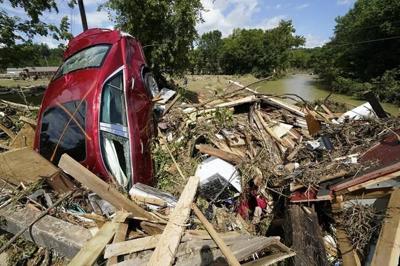 Crews search for missing in Tennessee deluge that killed 22