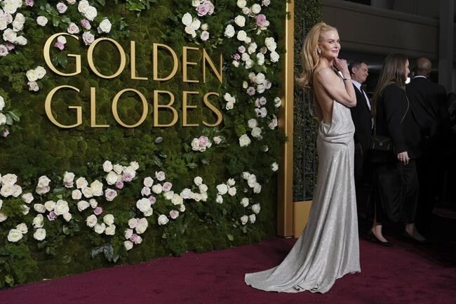 ariana grande yellow dress golden globes Golden Globes Fashion: Ariana Grande eschews Glinda pink for pale yellow (brick road) silk