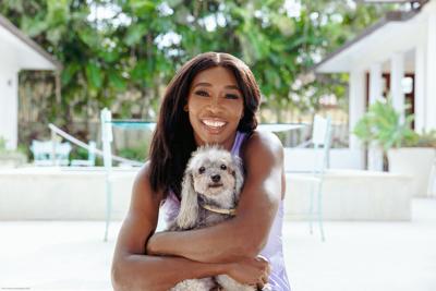 Photos: Athletes and their dogs