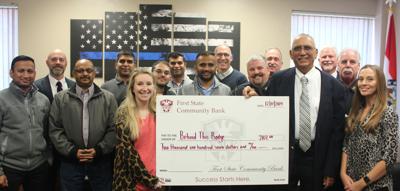 Motel Owners Bank Donate 2 107 To Behind The Badge News Phelpscountyfocus Com