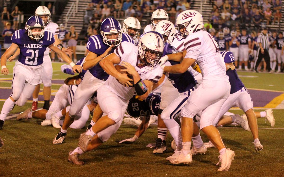 FOOTBALL: Balanced Lakers hand Dogs season-opening setback