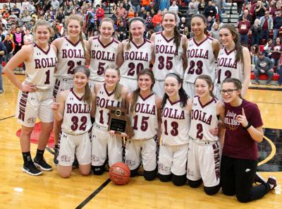 Basketball Lady Dogs Hold Off Upset Bid For First District Title