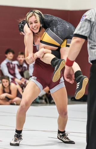 Three local wrestlers capture Central Section Grand Masters titles, Archives