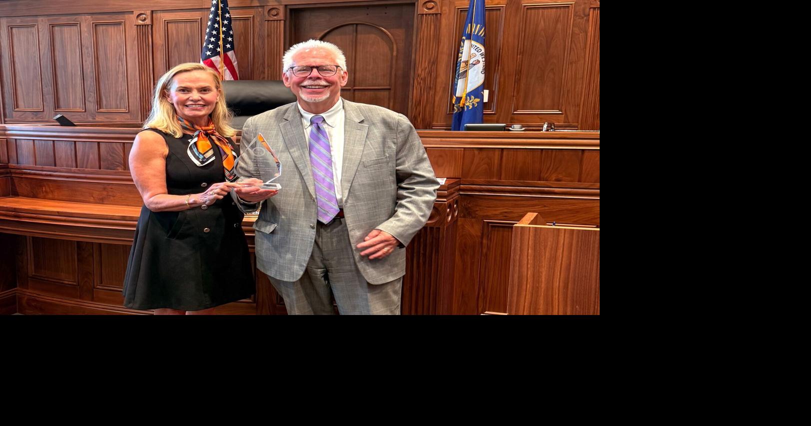 Legal community honors Baxter and Riley for years of service