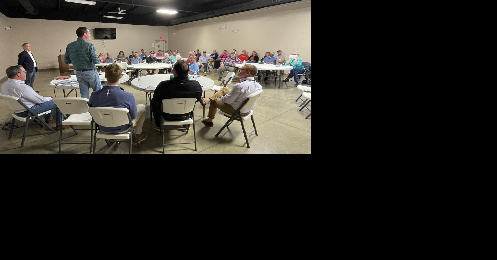 Industrial developers discuss building plans with locals