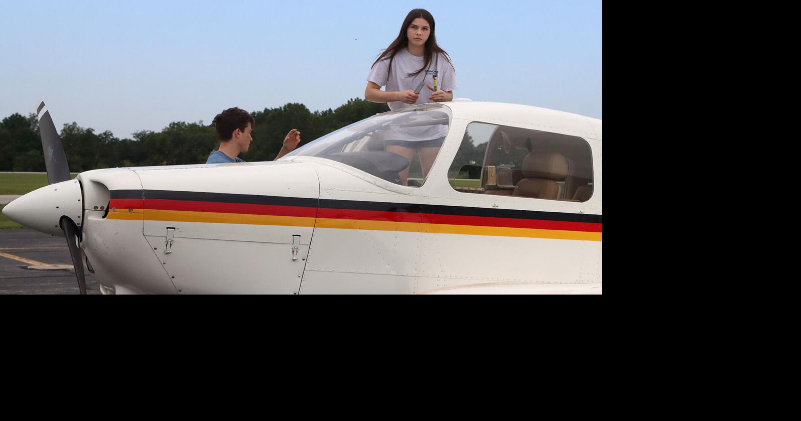 Twins both perform solo flights on birthday