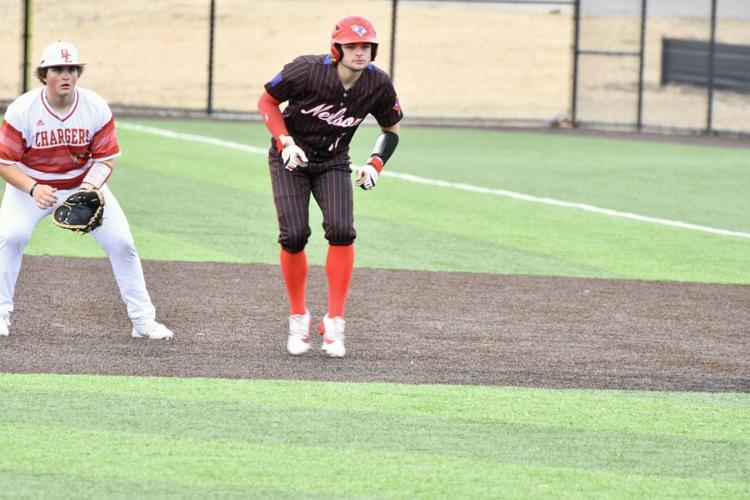 Robbins, Cardinals crush Dragons